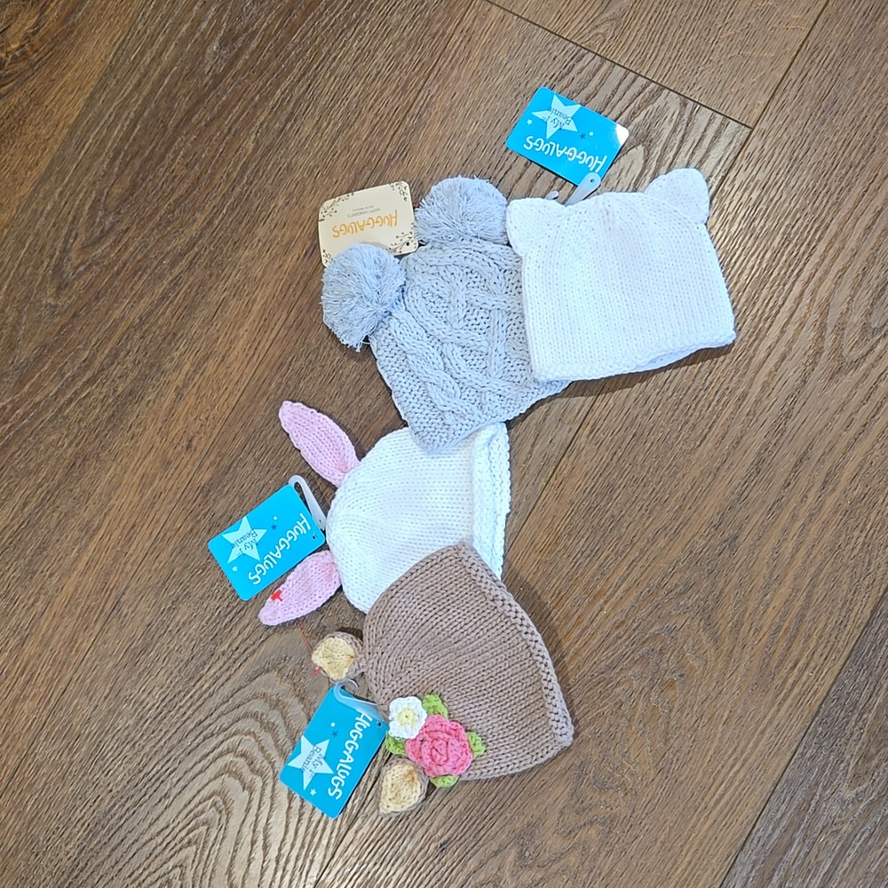 FOUR NWT NEWBORN HUGGALUGS KNIT BEANIES.. #6680